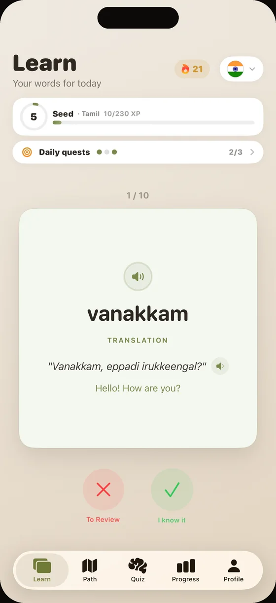 Scherm van de Dialect-app (Engelse interface) in het Tamil: de kaart “vanakkam”, met duidelijke audio bij elk woord